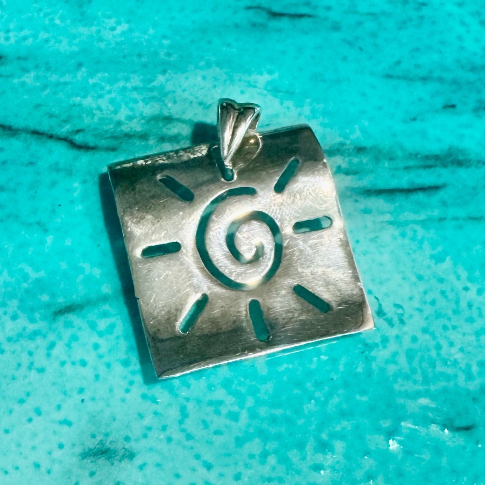 Elegant Silver Sun Pendant 925